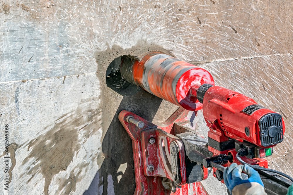 Diamond core drilling rig anchored to a concrete slab on a UAE site